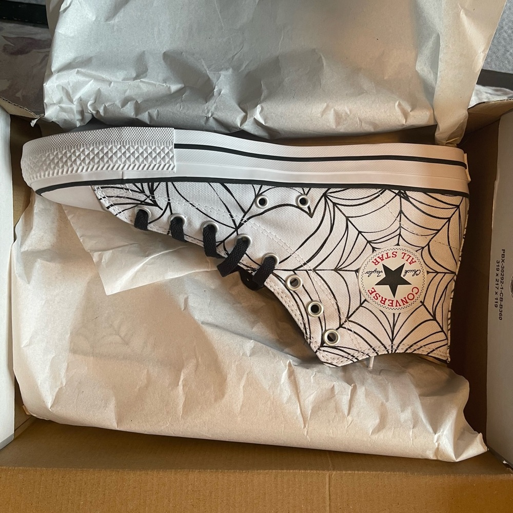 Converse White and Black High-Top Sneakers